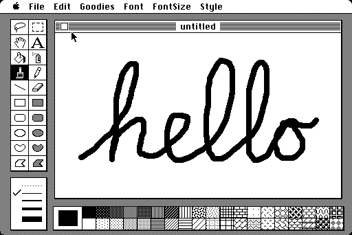 In MacPaint, the word 'hello' is written in cursive.